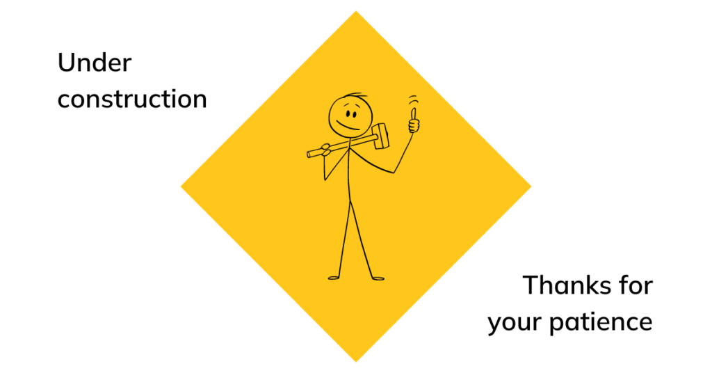 Text: "Under Construction. Thanks for your patience." Image: stick figure holding a hammer and giving a thumbs-up.